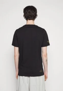 Pl GraphicT-Shirt Con StampaPuma Black Uomo T-shirt E Polo PU122O0OH-Q11 -Pier One Italia 2025 37194e5ea72c4210b9b1f592e4e1b24d