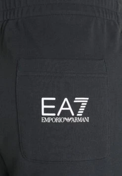 EA7 Emporio Armani TrouserPantaloni SportiviDark Blue/White Uomo Pantaloni Sportivi E Joggers EA722E00P-K11 -Pier One Italia 2025 39779decbf9e4e8e81d279baaa9f5e99