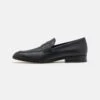 Coach LoaferMocassini ElegantiBlack Uomo Scarpe Eleganti COH12C00C-Q11 -Pier One Italia 2025 aaf8493212e14be7b836ddafdb7222da