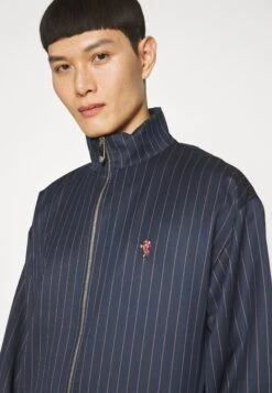 GCDS Wirdo - Giacca Leggera - Blue -Pier One Italia 2025 bb0694eed10c48b08d1fa47fc7057e11