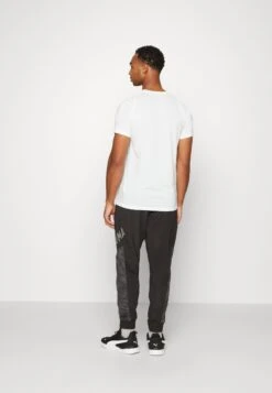 Puma Concept Hyperwave JoggerPantaloni SportiviBlack/Cool Dark Gray Uomo Pantaloni PU142E1I4-Q11 -Pier One Italia 2025 e4580d41f4a448ec8c5e574992845fef