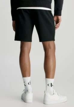Calvin Klein Jeans Logo Tape JoggerShortsCk Black Uomo Bermuda C1822F05G-Q11 9 Calvin Klein Jeans Logo Tape JoggerShortsCk Black Uomo Bermuda C1822F05G-Q11 -Pier One Italia 2025 eb24ddb2eb6a46ca85b2b573e481bb0e